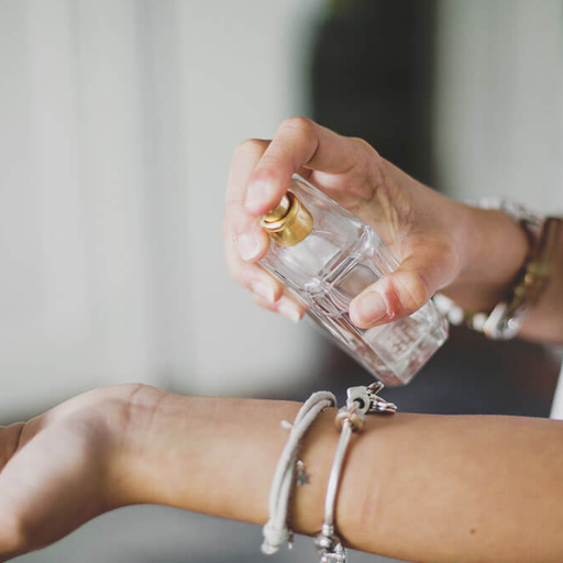 How can women make perfume last longer when applied to wrists and ankles