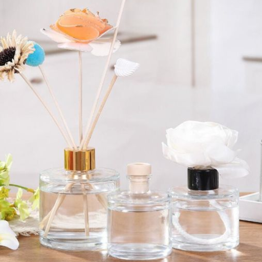 What are creative ways to recycle or repurpose empty perfume bottles