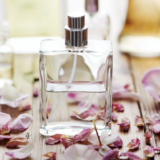 What should I examine on the perfume bottle itself to spot a fake