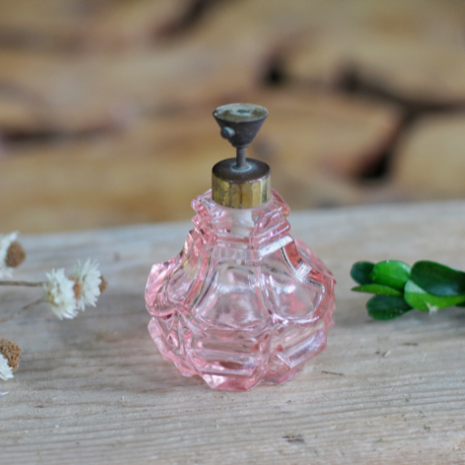 Why is a Pink Glass Perfume a Must-Have for Home Decor?